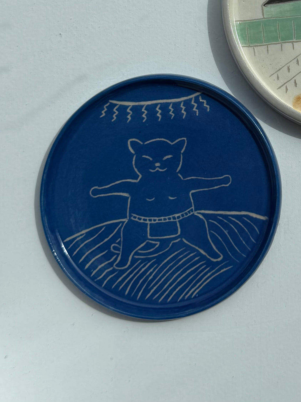 Sumocat plate blue